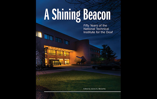 RIT building with text saying, "A shining beacon, fifty years of the national technical institute for the deaf."