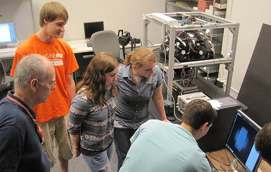 People looking at computer