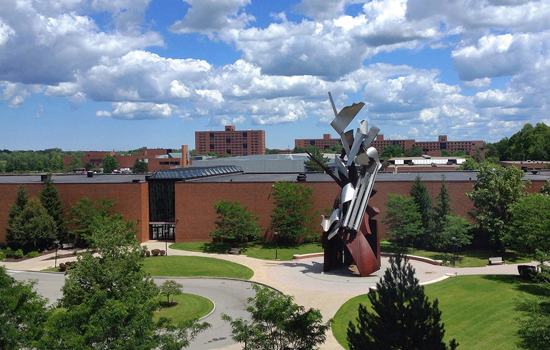 Picture of classroom buildings and statue