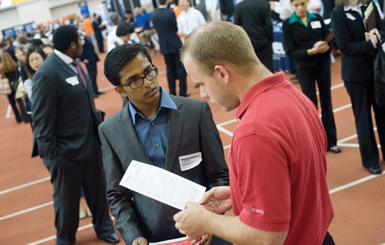 People interviewing at job fair