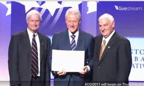 President clinton posing with professors