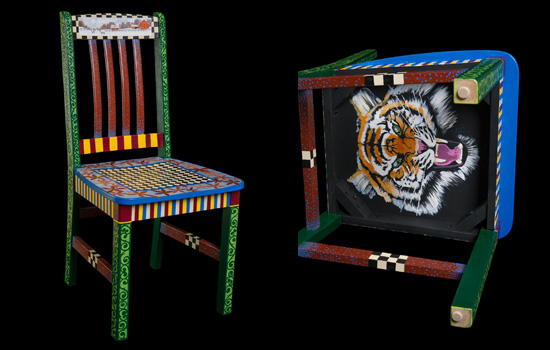 Picture of decorative chair with tiger painted on bottom