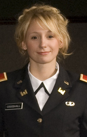 Person posing in uniform for camera