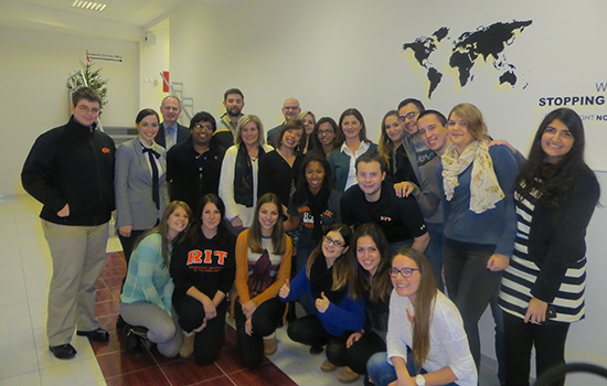 Students and Faculty pose for camera