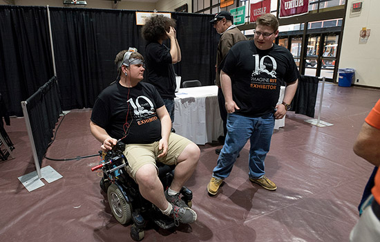 Person demonstrating tech in wheelchairs