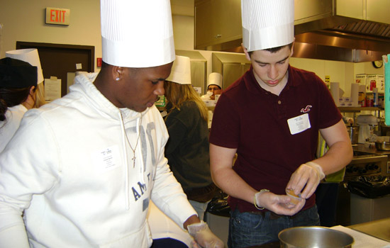 People cooking in kitchen