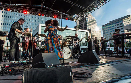 Rochester soul band Danielle Ponder and the Tomorrow People performing on stage.