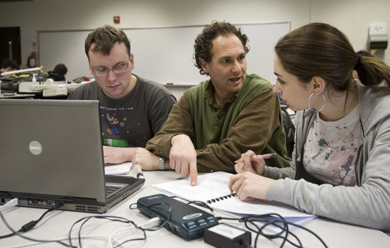 Professor working with students