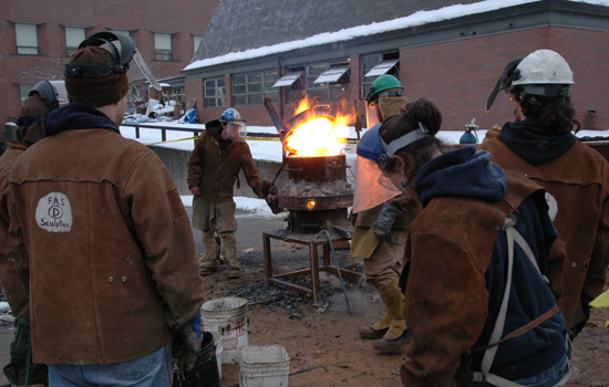 Students gathered around a furnace