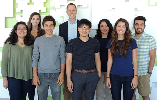 Research team posing for camera