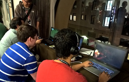 People working on computers at desk