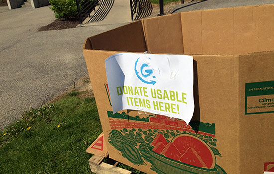 a box with a sign that says, "donate usable items here".