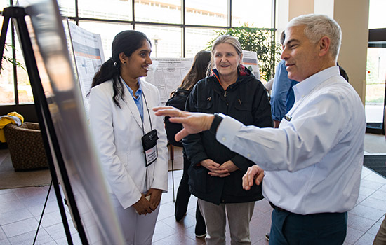 Students and Professors talking about Project