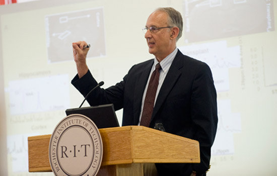 Person giving speech at podium