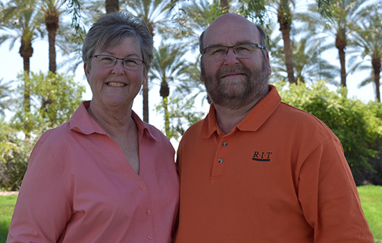 Barbara Ray and Samuel Holcomb posing for picture