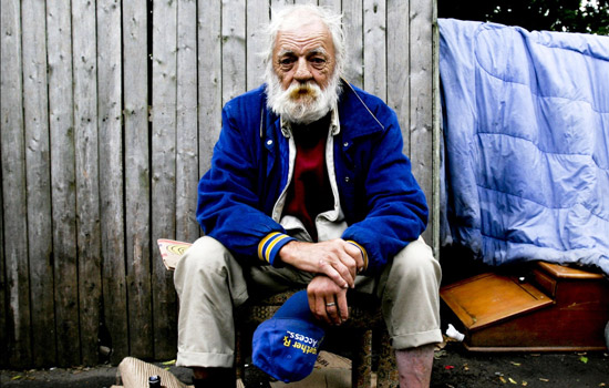 Homeless man posing for camera