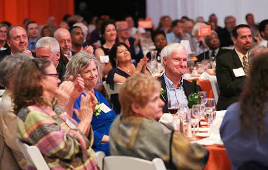 RIT President smiling at formal event 