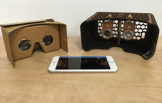 a smartphone and two pairs of virtual reality headsets.