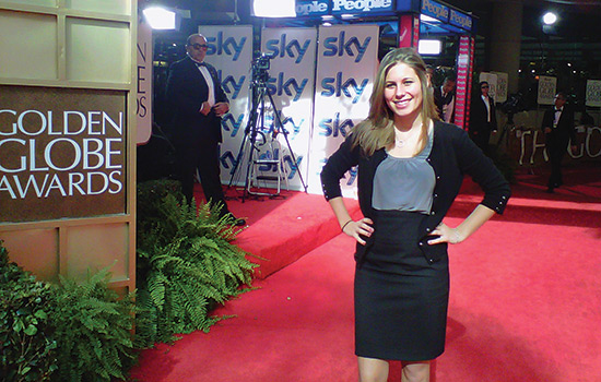 Person posing on red carpet
