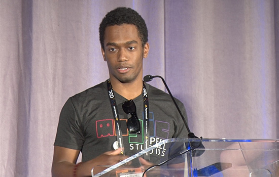 Person speaking at podium at event