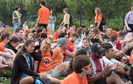 New students gathered on field together