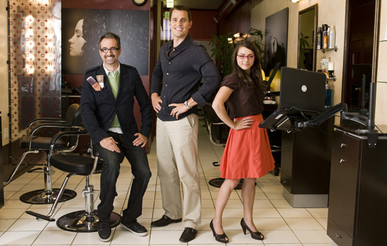 Three Television hosts posing in studio