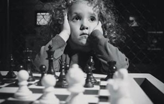 Child playing chess