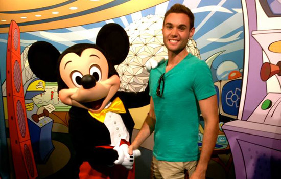 Person posing with Mikey Mouse