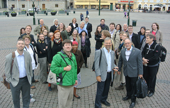 People gathered for picture in plaza