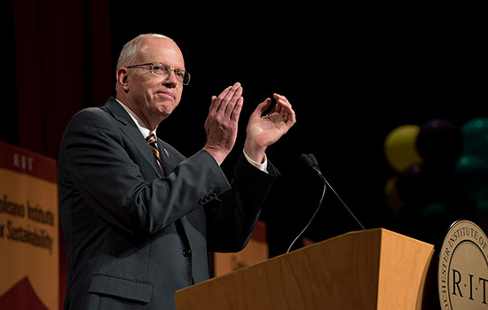 President Munson giving speech at podium