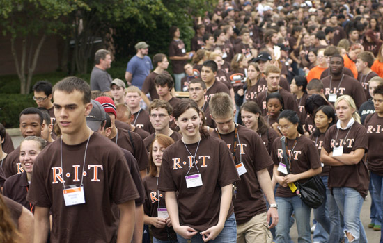 New RIT students walking along path