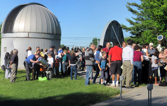 People gathered outside observatory 