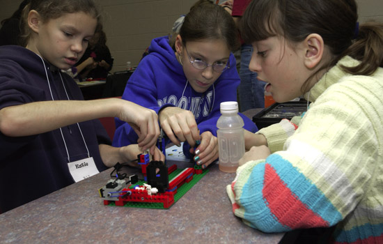 Children building robot