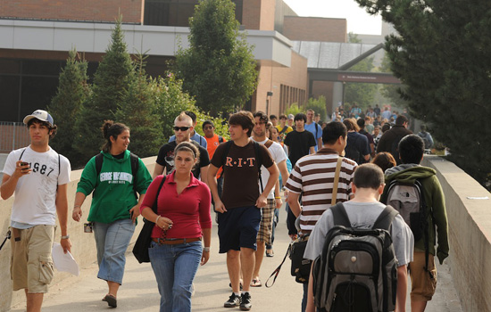 People walking down pathway