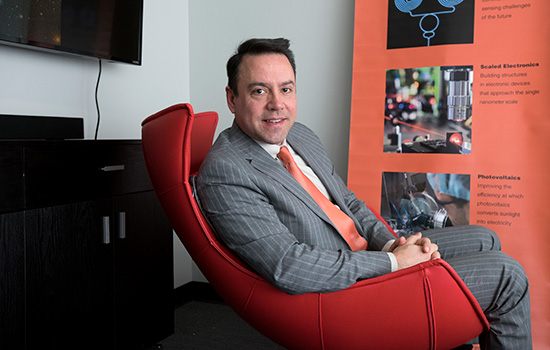 Person posing for camera in chair