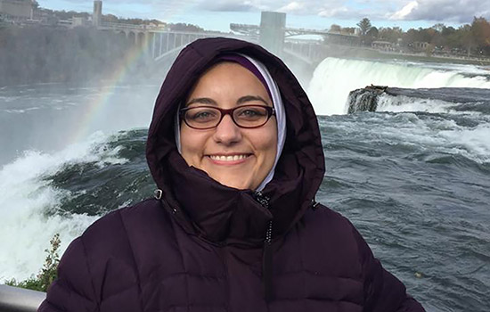 Person posing at Niagara falls