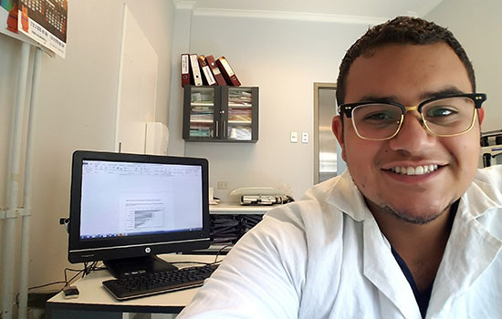 A selfie of Luis Reyes-Umana in an office at a hospital in Chile.