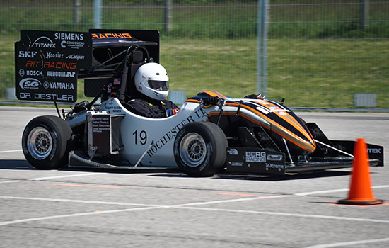 Person driving in formula car