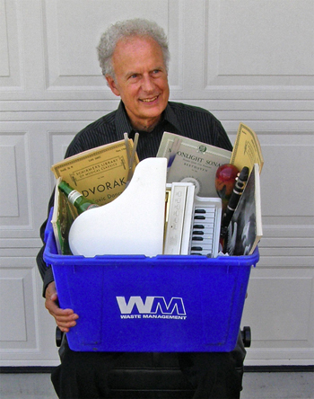 Person holding recycling bin