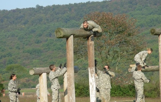 People climbing obstacles