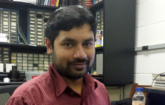 Person posing in office