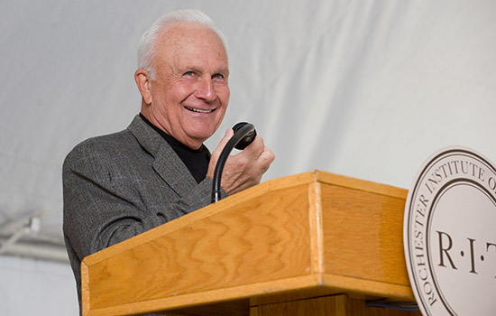 Person giving speech at podium