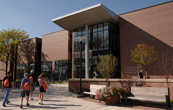 Students in front of Saunders College of Business