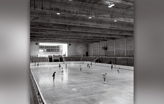People skating in ice rink
