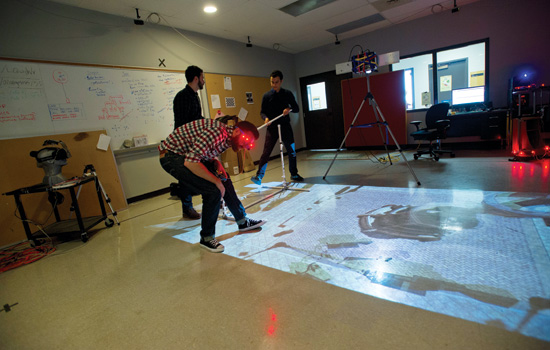 People working with projection