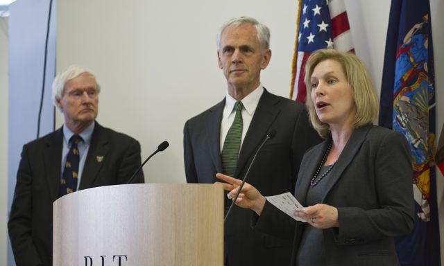 People standing at podium