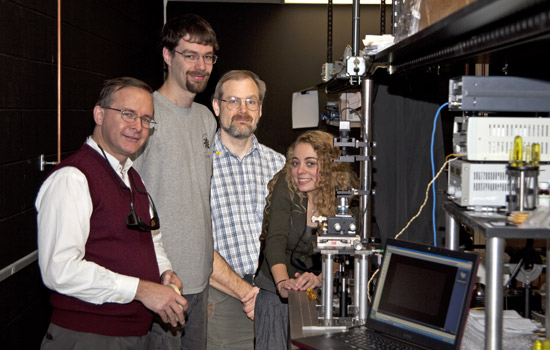 Students and Professors posing in lab