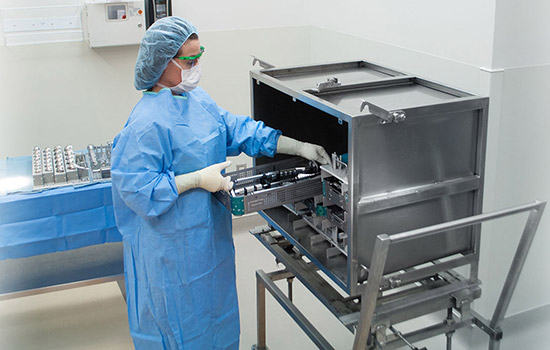 Scientists cleaning equipment