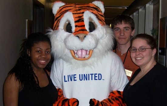 People standing with Tiger Mascot
