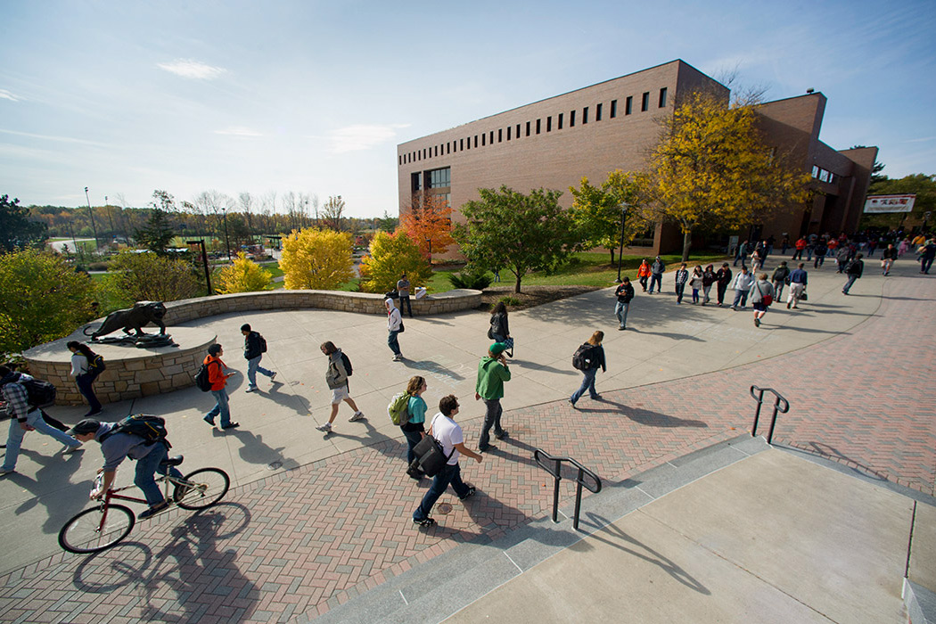 An aerial view of students walking down the quarter mile on RIT's Henrietta campus.